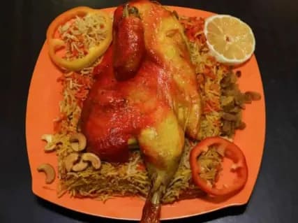 1/2 فرخة مندي + أرز + سلطة