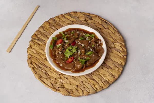 Meat Dish With Curry Sauce And Potatoes